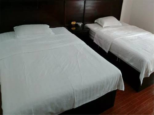 Imagen de la habitación del Guilin Qinglin Inn. Foto 3