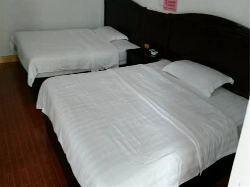 Imagen de la habitación del Guilin Qinglin Inn. Foto 5
