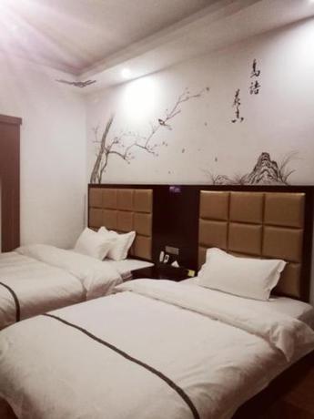 Imagen de la habitación del Guizhou Huangguoshu East Guesthouse. Foto 8