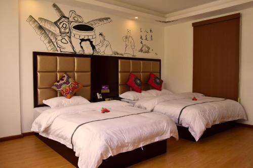 Imagen de la habitación del Guizhou Huangguoshu East Guesthouse. Foto 9