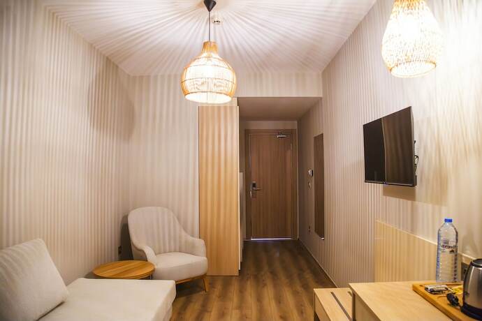 Imagen de la habitación del Gulluk Elegance Otel. Foto 13