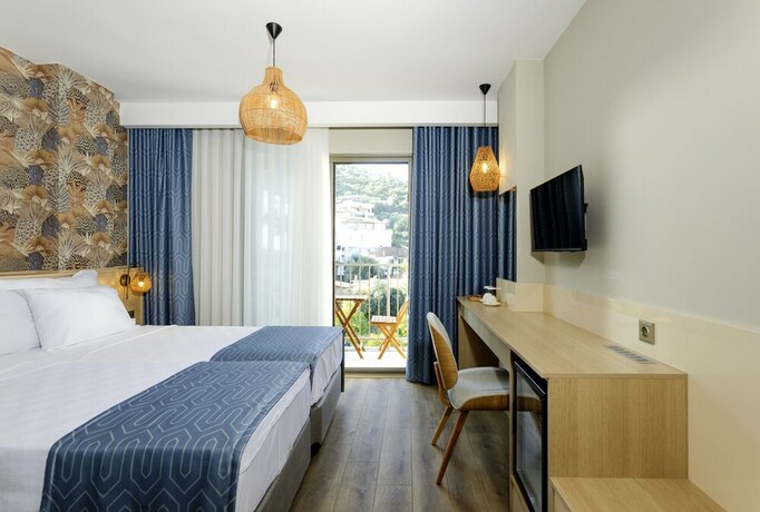 Imagen de la habitación del Gulluk Elegance Otel. Foto 14