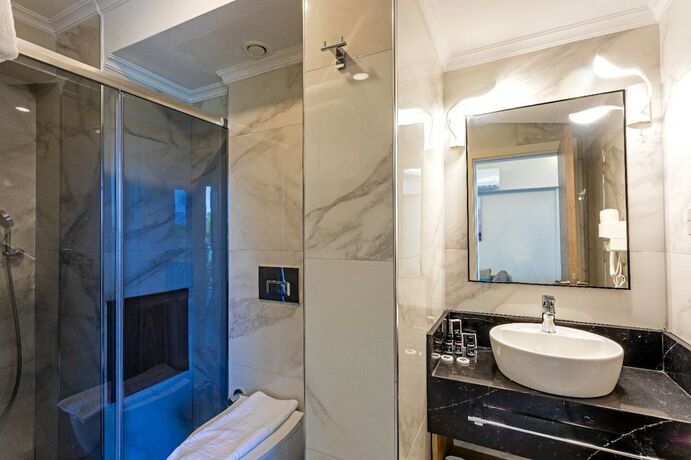 Imagen de la habitación del Gulluk Yali Boutique Hotel. Foto 17