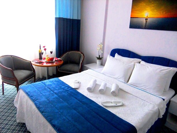 Imagen de la habitación del Gumuldur Mavi Deniz Otel. Foto 15