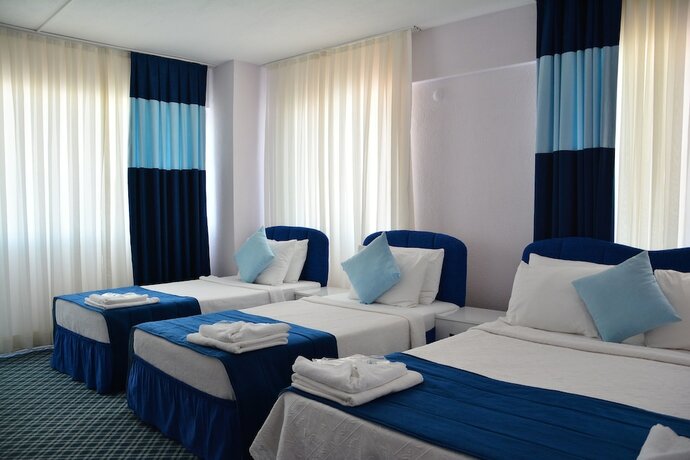 Imagen de la habitación del Gumuldur Mavi Deniz Otel. Foto 16