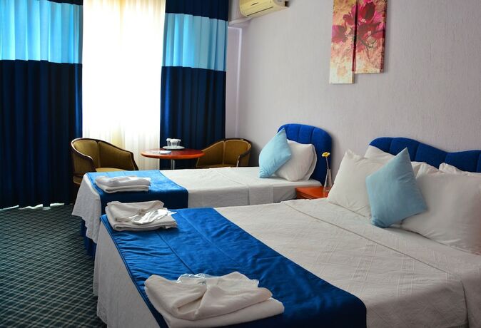 Imagen de la habitación del Gumuldur Mavi Deniz Otel. Foto 18