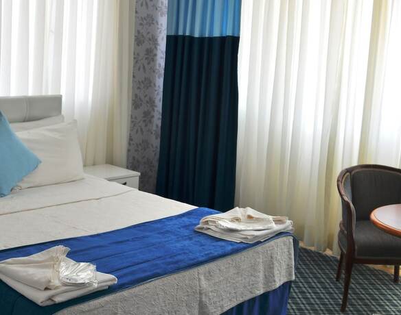 Imagen de la habitación del Gumuldur Mavi Deniz Otel. Foto 20