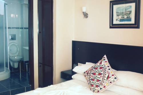Imagen de la habitación del Gumus Hotel, Ayvacık. Foto 1