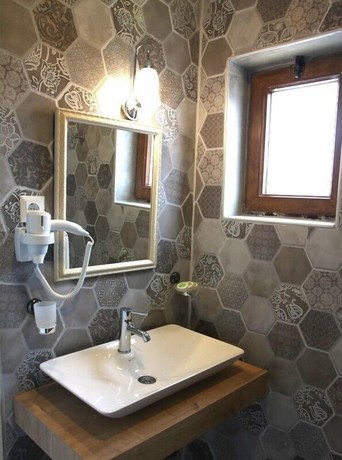 Imagen de la habitación del Gumus Hotel. Foto 17