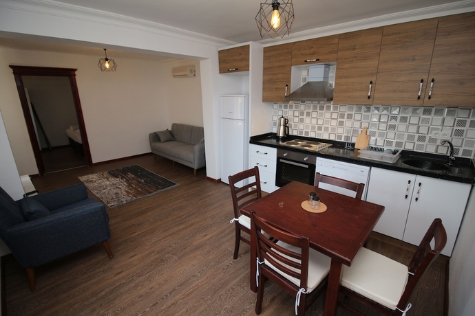 Imagen de la habitación del Gumusluk Tramonto Evleri. Foto 2