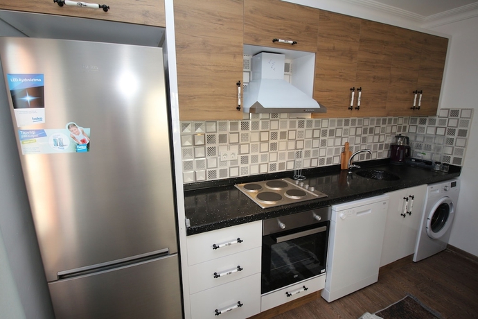 Imagen de la habitación del Gumusluk Tramonto Evleri. Foto 6