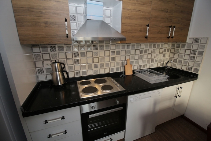 Imagen de la habitación del Gumusluk Tramonto Evleri. Foto 7