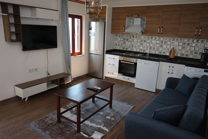 Imagen de la habitación del Gumusluk Tramonto Evleri. Foto 8
