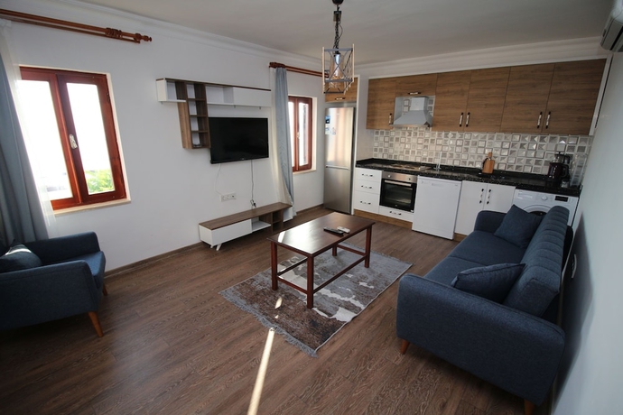 Imagen de la habitación del Gumusluk Tramonto Evleri. Foto 9