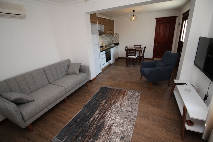 Imagen de la habitación del Gumusluk Tramonto Evleri. Foto 10