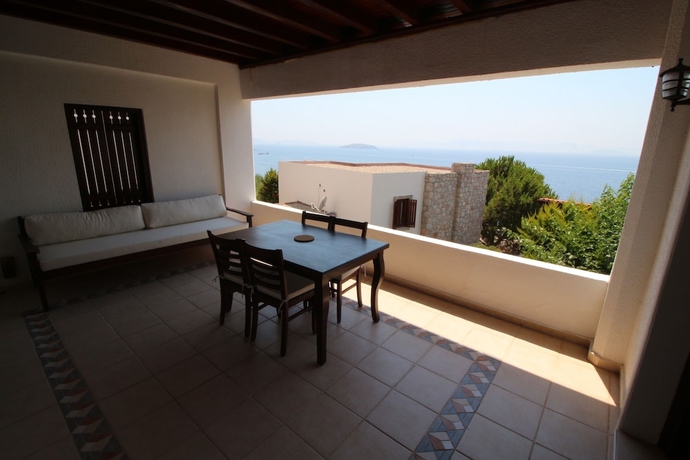Imagen de la habitación del Gumusluk Tramonto Evleri. Foto 11