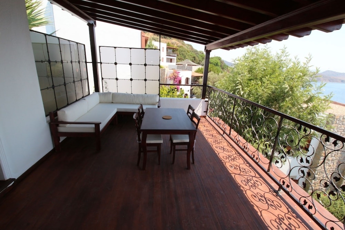 Imagen de la habitación del Gumusluk Tramonto Evleri. Foto 12