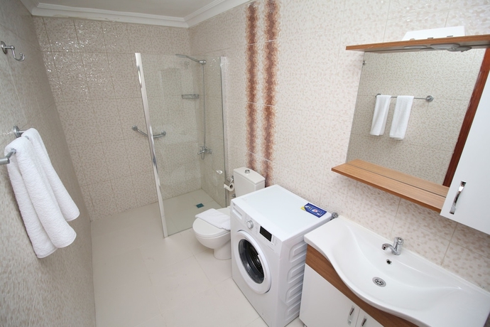 Imagen de la habitación del Gumusluk Tramonto Evleri. Foto 15