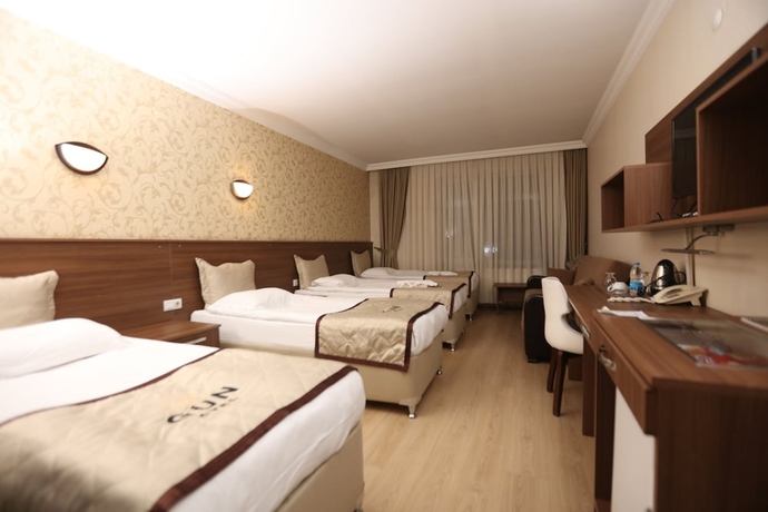 Imagen de la habitación del Gun Otel. Foto 7