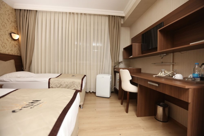 Imagen de la habitación del Gun Otel. Foto 8