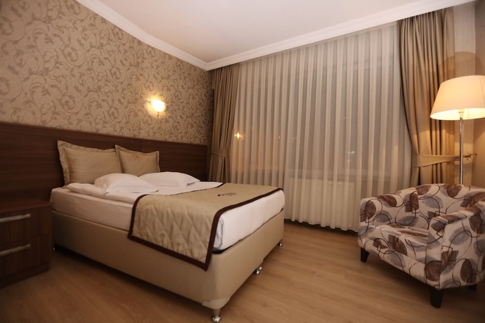 Imagen de la habitación del Gun Otel. Foto 10