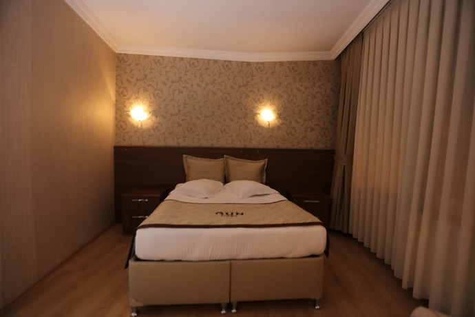 Imagen de la habitación del Gun Otel. Foto 13