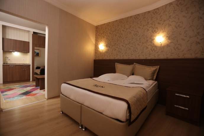 Imagen de la habitación del Gun Otel. Foto 14