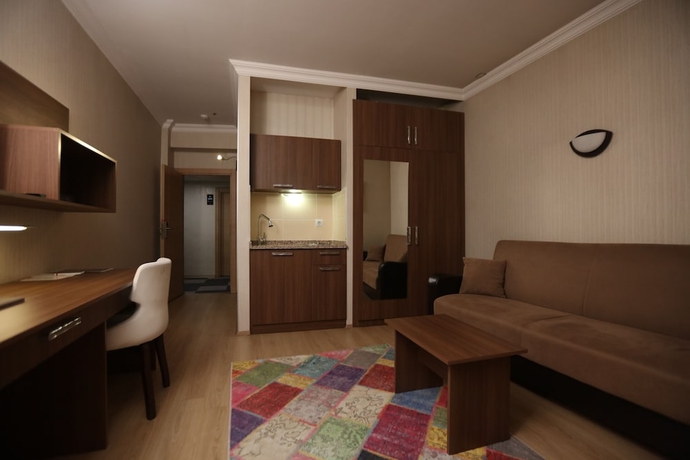 Imagen de la habitación del Gun Otel. Foto 16