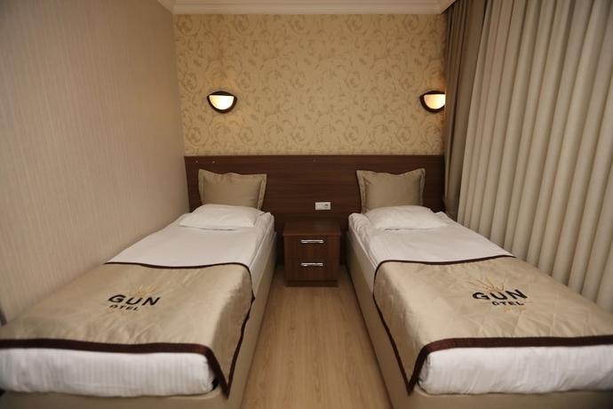 Imagen de la habitación del Gun Otel. Foto 17