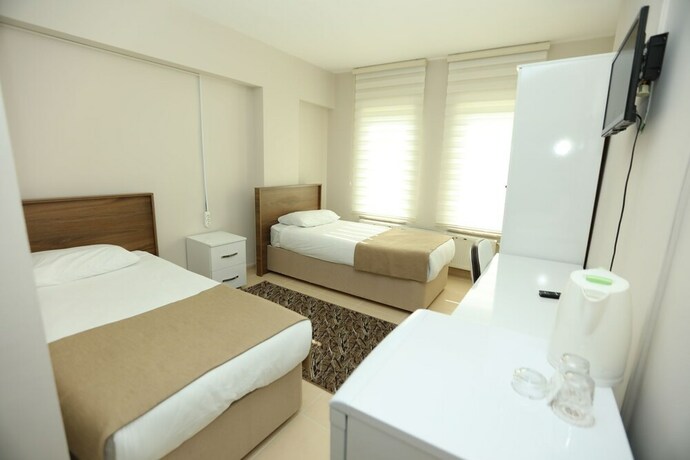 Imagen de la habitación del Gun Residence Otel. Foto 11