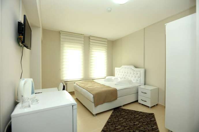 Imagen de la habitación del Gun Residence Otel. Foto 12