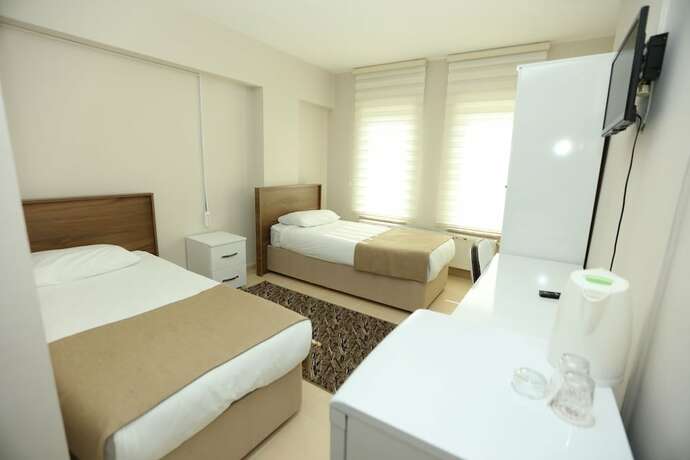 Imagen de la habitación del Gun Residence Otel. Foto 13