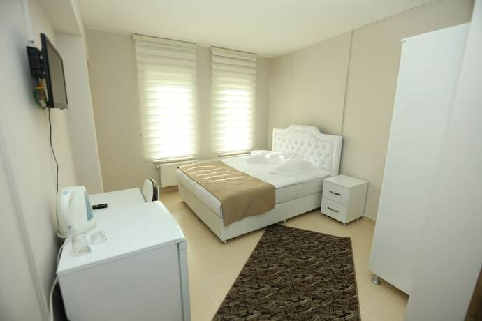 Imagen de la habitación del Gun Residence Otel. Foto 14