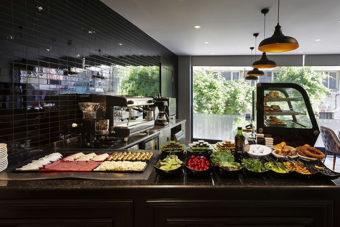 Imagen del bar/restaurante del Guner Business Hotel. Foto 5