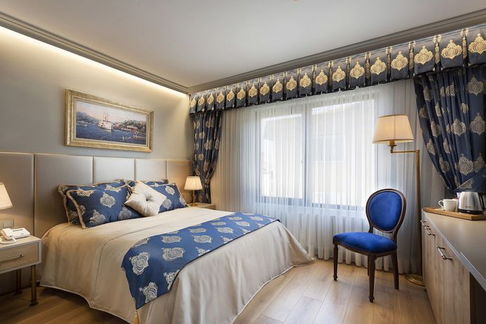 Imagen de la habitación del Guner Business Hotel. Foto 16
