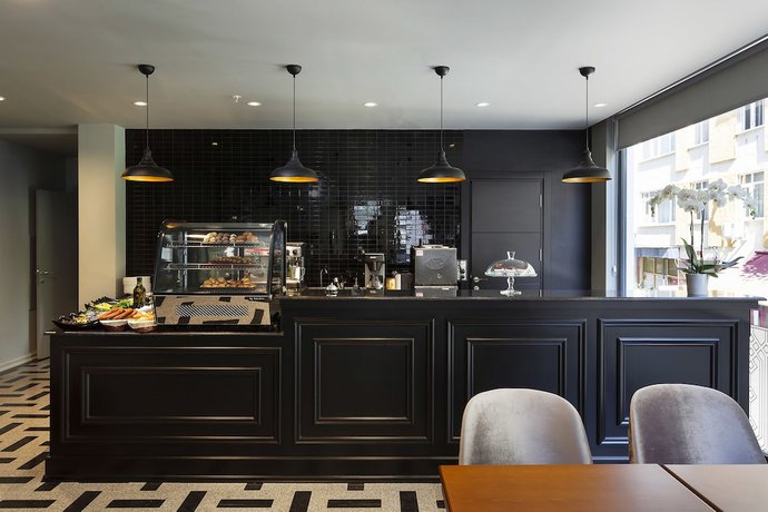 Imagen del bar/restaurante del Guner Business Hotel. Foto 6
