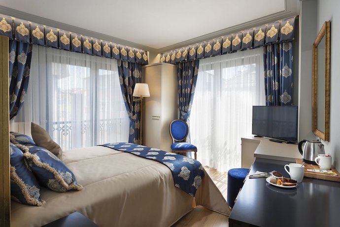 Imagen de la habitación del Guner Business Hotel. Foto 17