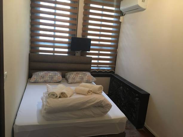 Imagen de la habitación del Guner Hotel. Foto 15