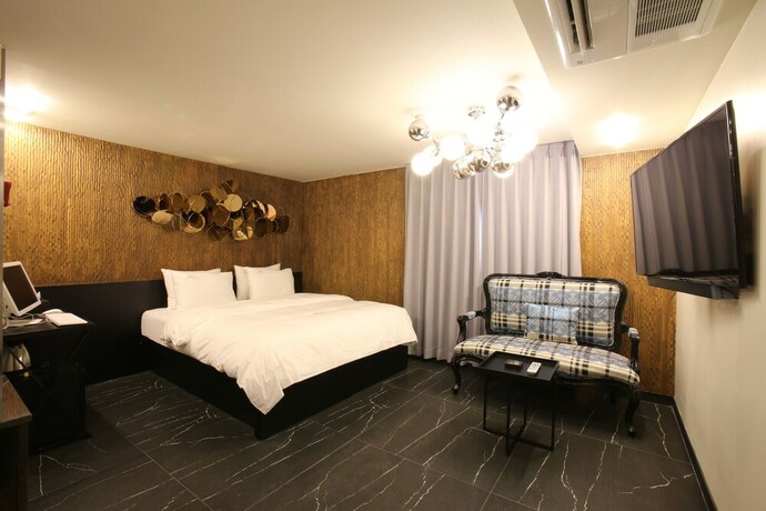 Imagen de la habitación del Guri Cello Hotel. Foto 22