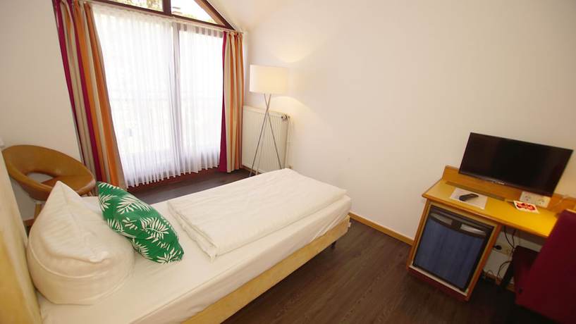 Imagen de la habitación del Gut-hotel Tannenhof. Foto 16