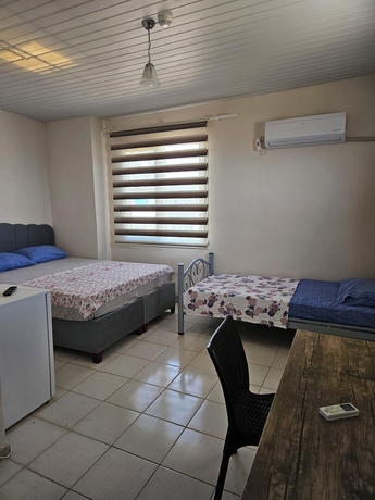 Imagen de la habitación del G&uuml;rb&uuml;z Otel. Foto 4