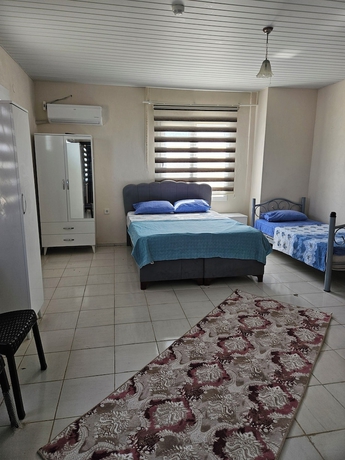 Imagen de la habitación del G&uuml;rb&uuml;z Otel. Foto 5