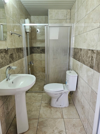 Imagen de la habitación del G&uuml;rb&uuml;z Otel. Foto 9