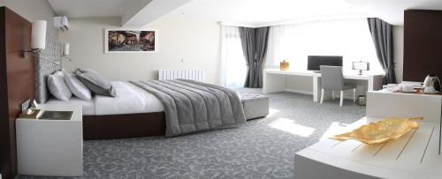 Imagen de la habitación del Guvenay Business Hotel. Foto 6
