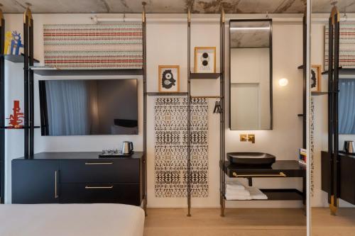 Imagen de la habitación del Gymnasia Isrotel, a Tribute Portfolio Hotel. Foto 11