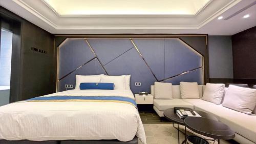 Imagen de la habitación del H Motel璽悅國際精品旅館. Foto 13