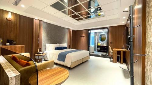 Imagen de la habitación del H Motel璽悅國際精品旅館. Foto 17