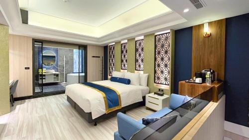 Imagen de la habitación del H Motel璽悅國際精品旅館. Foto 18