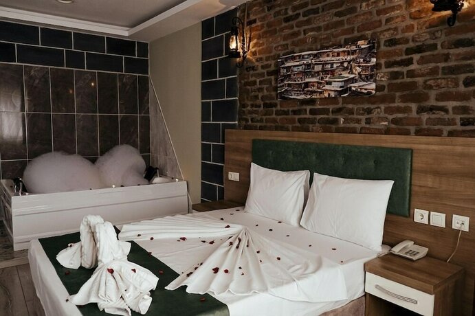 Imagen de la habitación del HASUNİ TAŞ HOTEL. Foto 14