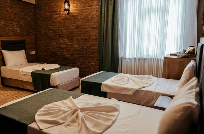 Imagen de la habitación del HASUNİ TAŞ HOTEL. Foto 15
